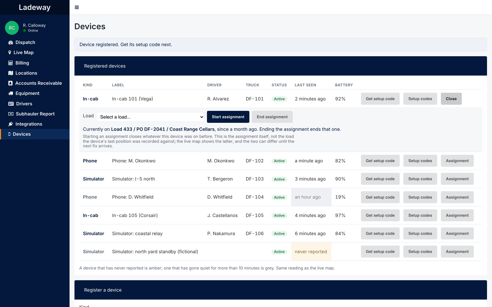 The Devices settings page. Seven registered devices list kind, label, driver, truck, status, last seen and battery. One row's last-seen cell is grey reading an hour ago; another is amber reading never reported. The top row is expanded to a load picker with Start assignment and End assignment buttons, and a line naming the load the device is currently on.