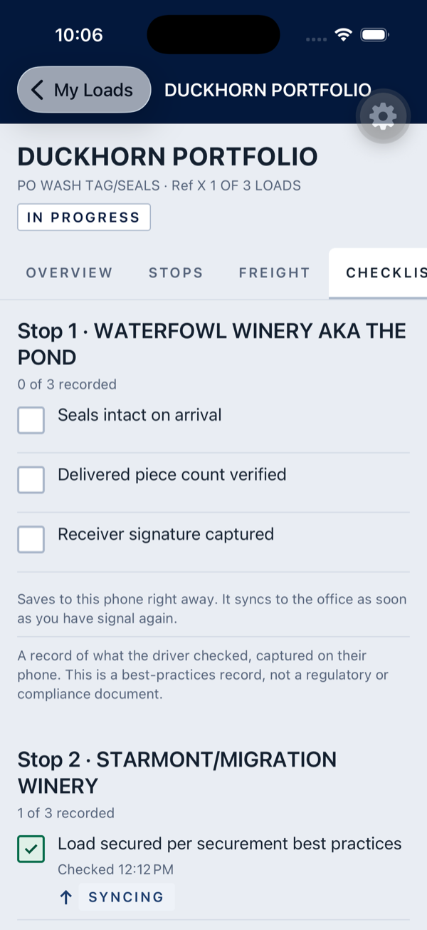 The driver app's pickup checklist for a stop: items such as seal intact and load secured, each with a checkbox, ticked on the phone at the dock.